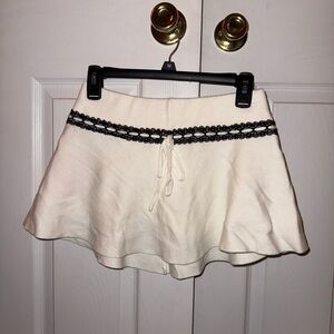 Edikted Cream Mini Skirt with Black Lace Accent